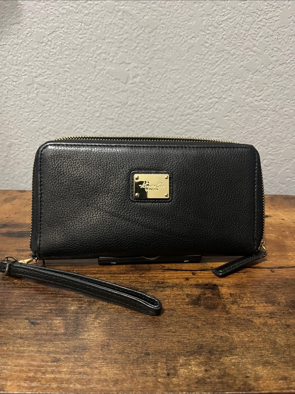 Kenneth Cole New York Black Leather Zip Wallet with Gold Plaque
